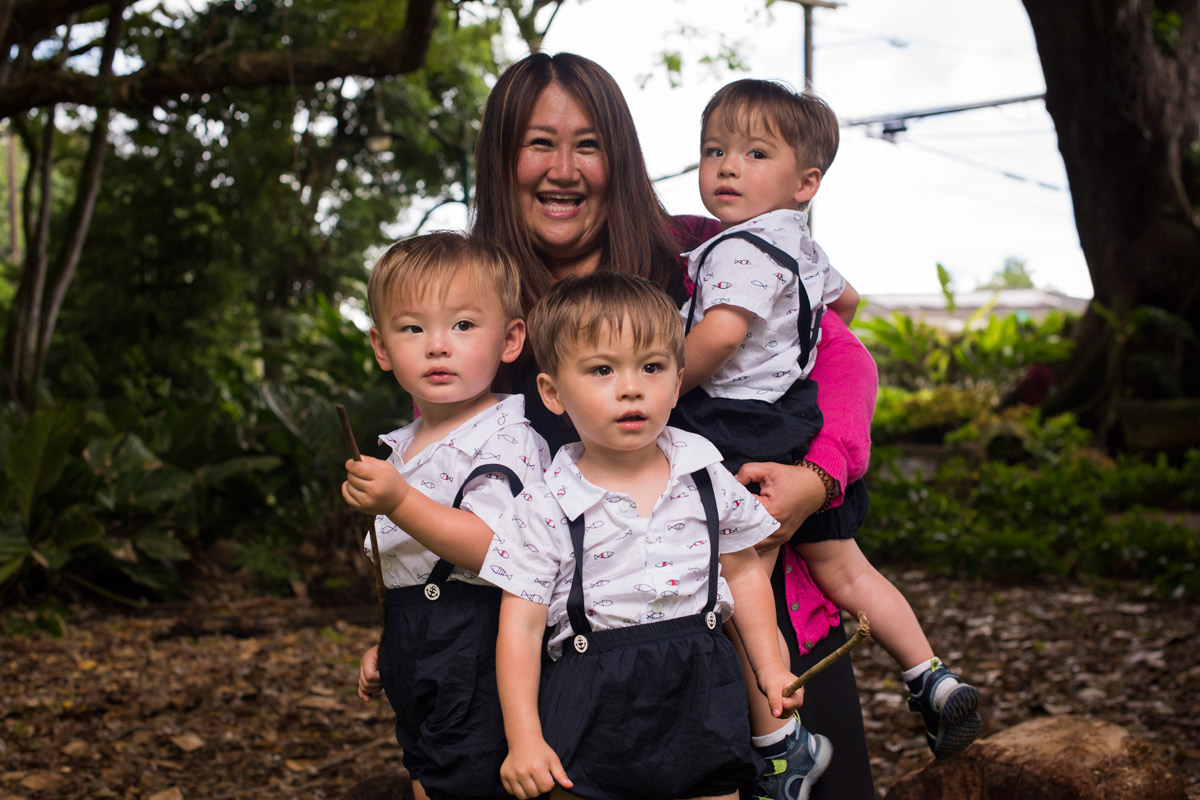 Michelle Kang-Mosher with triplet sons Michael, Shannon and Samual