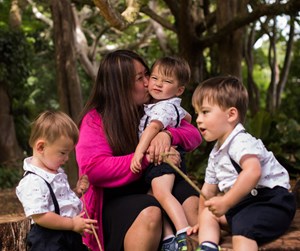 Michelle Kang-Mosher with triplets Michael, Shannon and Samual