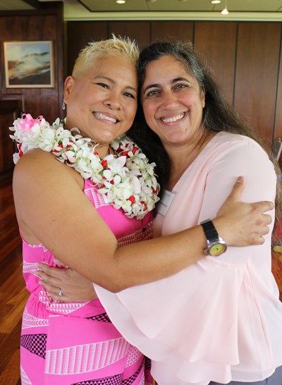 Leslie Kang gives a big hug to Kapiolani Surgical Oncologist Dr. Laura Peterson during the Wall of Hope unveiling ceremony, held at the Oahu Country Club in October 2019.