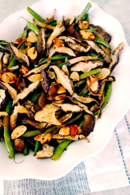 A bright and tangy dressing adds extra tasting notes without drowning out the slightly more delicate flavor profiles of the green beans and mushrooms.