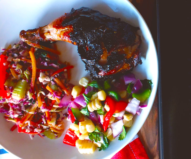 Bowl of Butterflied Cornish Hen with Smoky Balsamic Marinade & Roasted Corn Relish