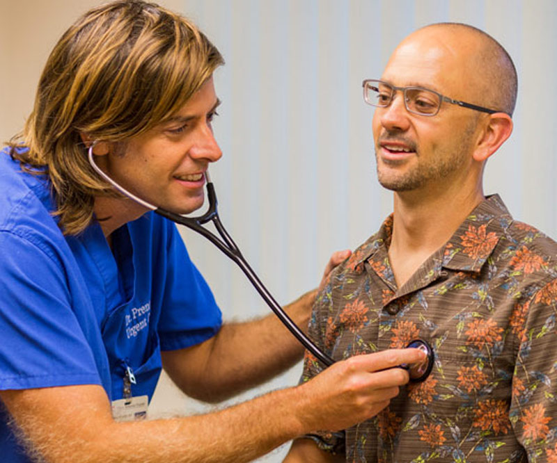 doctor examining his patient with a stethoscope