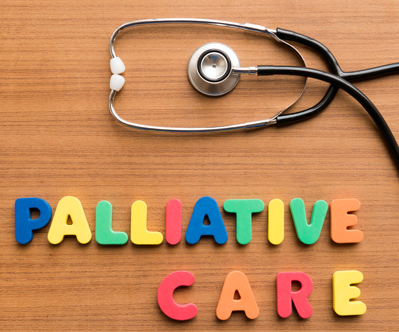 a stethascope with the words "palliative care" spelled out