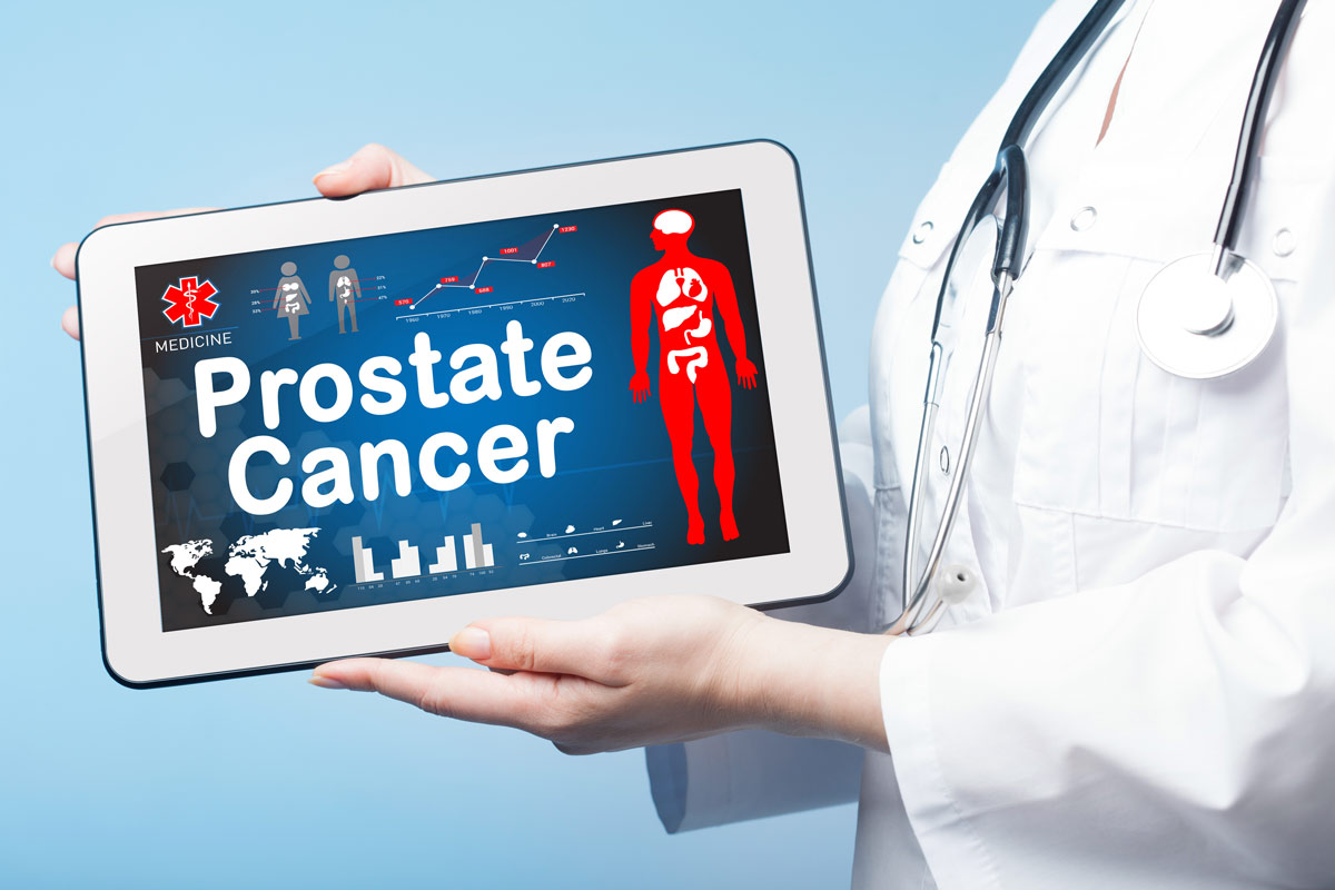 Doctor holding tablet that reads Prostate Cancer