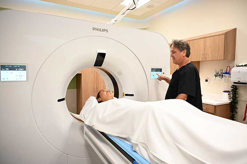Patient receiving services with the new CT scanner.