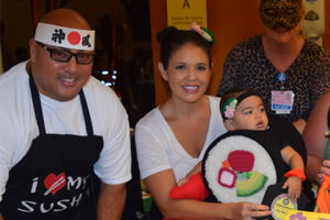 parents and kids dressed up for Halloween