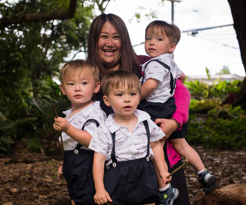 Michelle Kang-Mosher with triplet sons Michael, Shannon and Samual