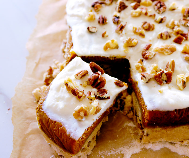 a side view of Pumpkin Crunch Cake with a large corner piece cut out