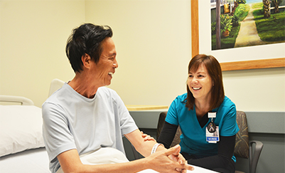 Nurse measuring blood pressure off patient