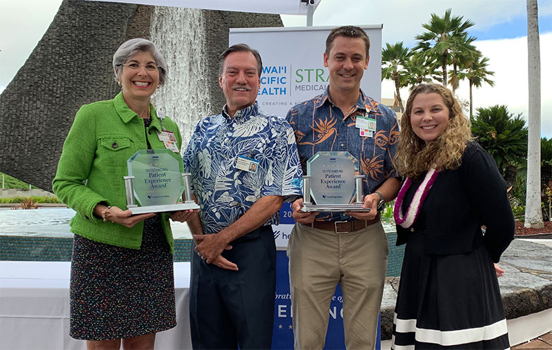 Pali Momi COO Gidget Ruscetta, Straub and Pali Momi CEO Art Gladstone, Straub COO Travis Clegg and Katharine Mongoven of Healthgrades pose with award trophies