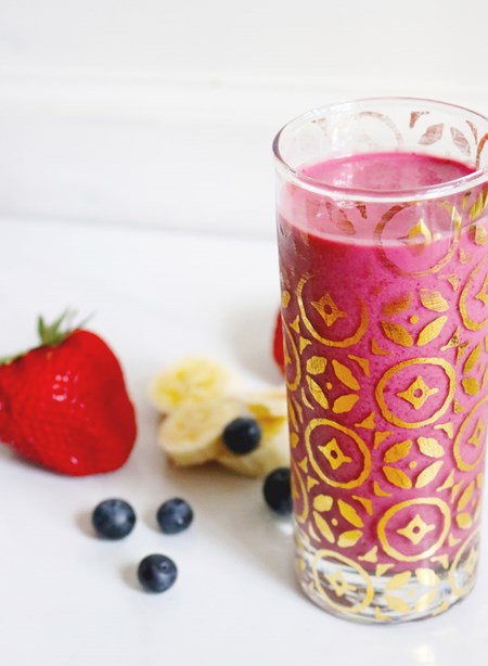 The smoothie’s pretty pink hue comes from a mixture of strawberries, blueberries and raspberries, but add different berries like blackberries or even acai berries to switch up the color!