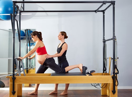 Women who were active prior to pregnancy can keep up their normal routine, but may need to modify certain exercises. Work with a personal trainer or coach to make the appropriate adjustments to accommodate your growing bump.