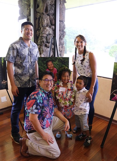 Skyla Teguh poses for a photo with her family and a very special friend – Dr. Wade Kyono, the pediatric oncologist-hematologist at Kapiolani who helped the entire ohana throughout Skyla's cancer diagnosis and treatment.