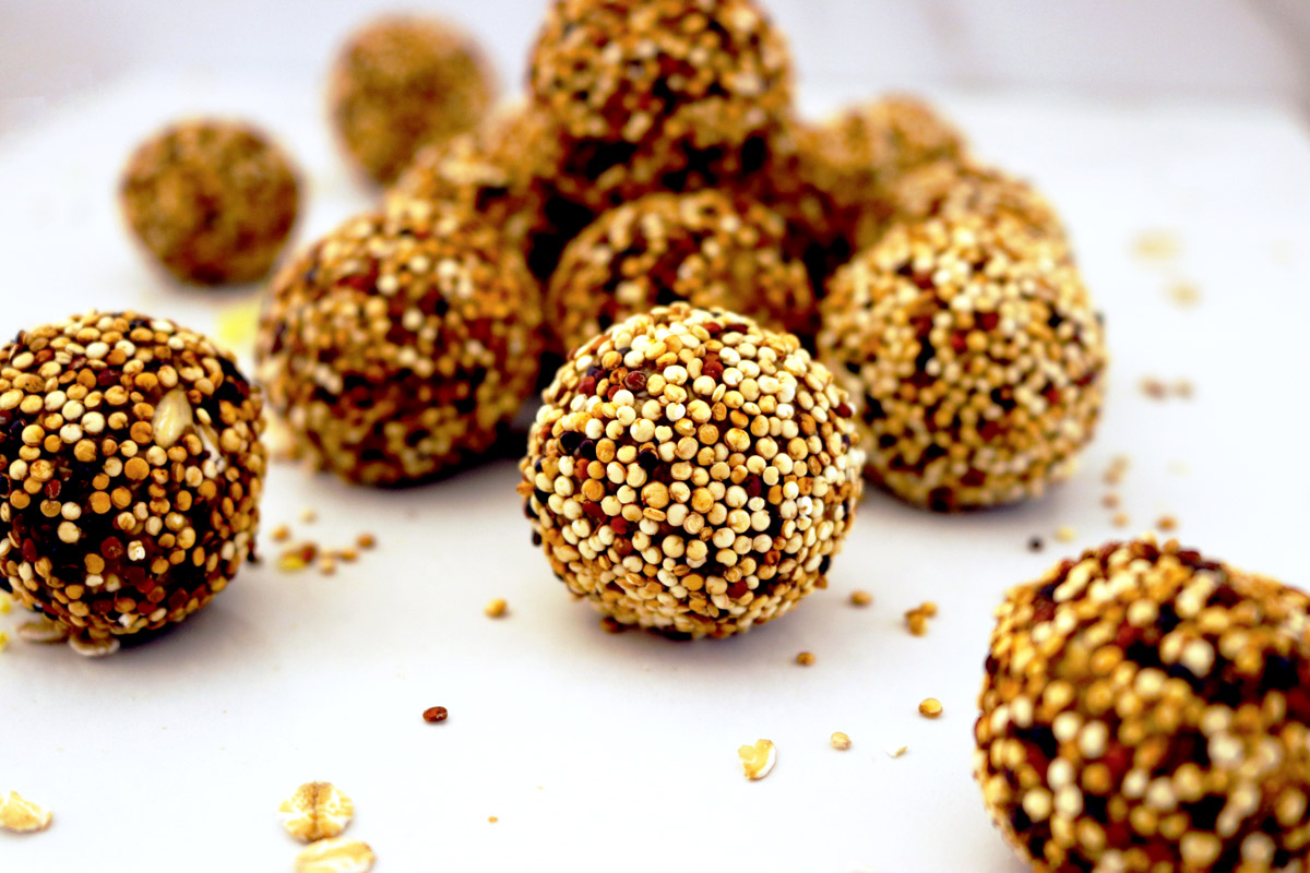 Lemon Ginger Energy Bites on a white marble counter