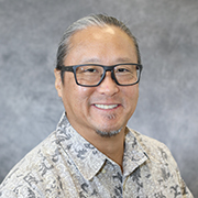 Photo of physician Byron Izuka