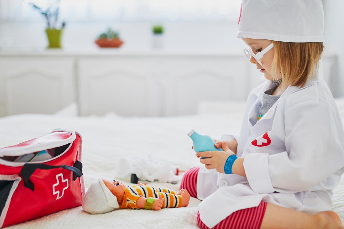 generic image of child playing physician