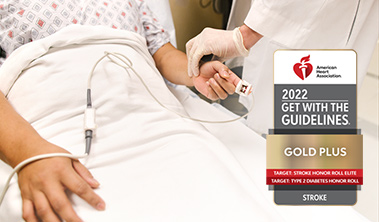 patient receiving bedside cardiovascular care and Get with the Guidelines stroke award