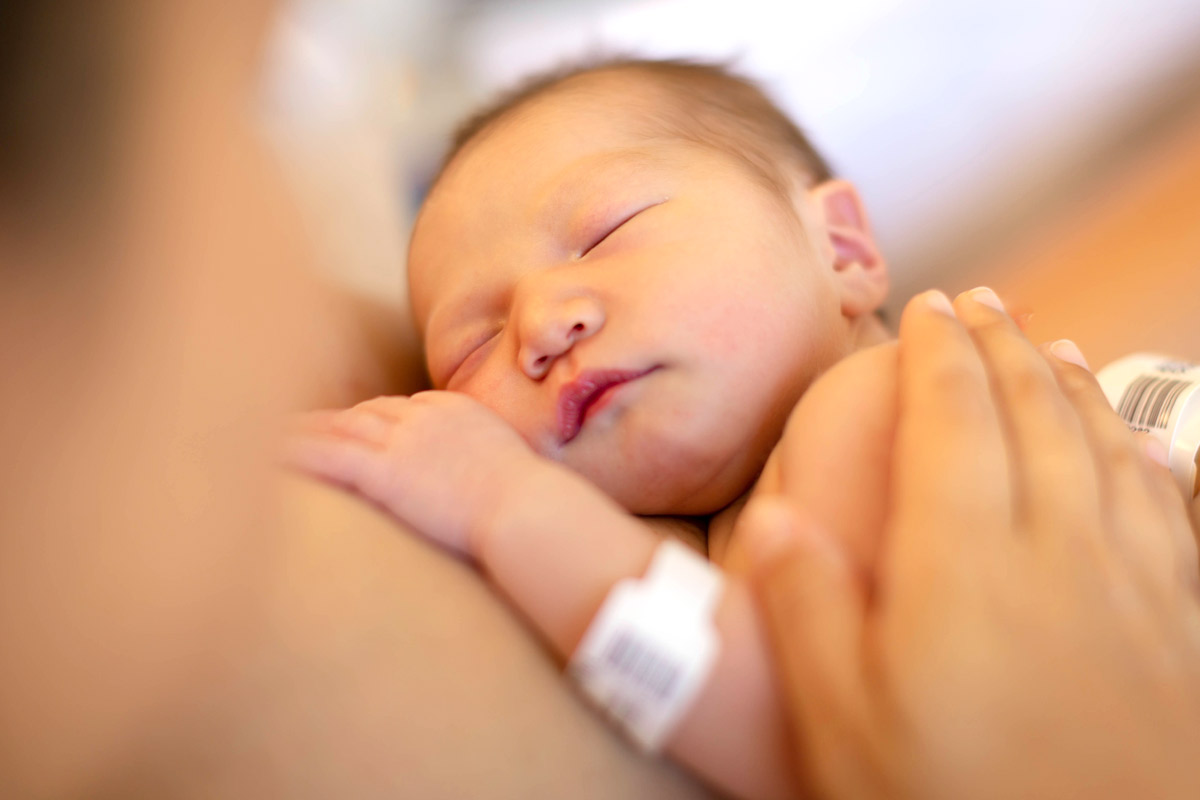 Mother holding her newborn baby