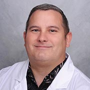 headshot of cardiac surgeon doctor Neil Stockmaster