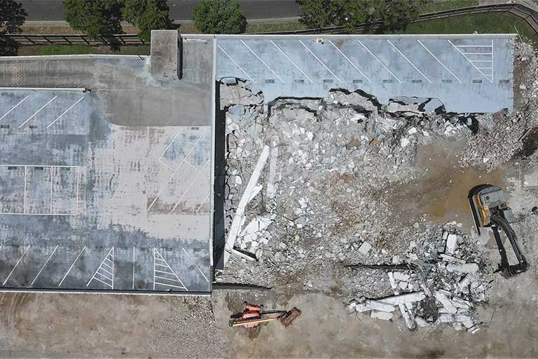 Building demolition on the site of the new Straub Medical Center campus