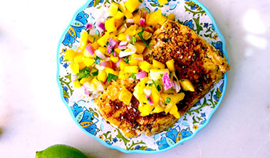 A colorful plate of Cajun-Spiced Mahimahi with Mango Pineapple Salsa
