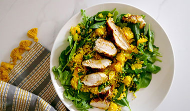 plate of curried chicken couscous salad.