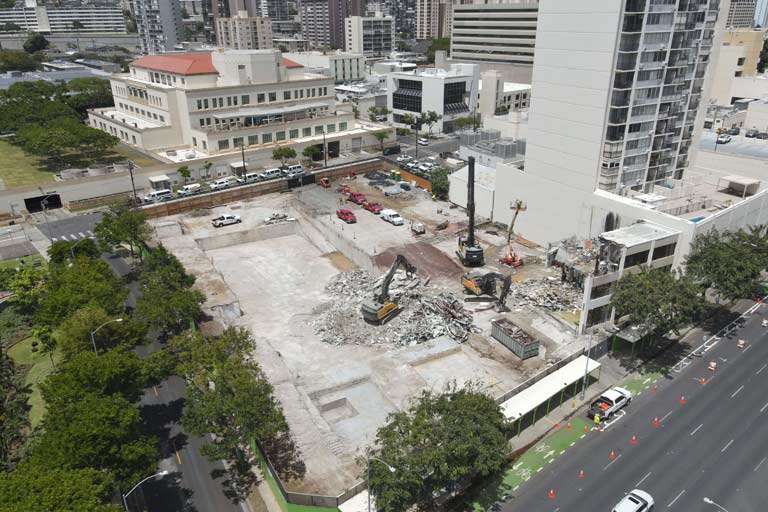 A wide shot aeriel view shows the demoltion progress of the former building location of the Physical Therapy and Occupational Therapy Health Services at 800 South King Street.