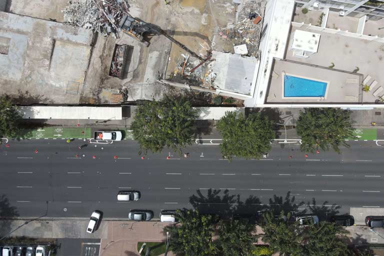 An overhead aeriel view of the demolition process and street access of the former Physical Therapy and Occupational Therapy Health Services building.