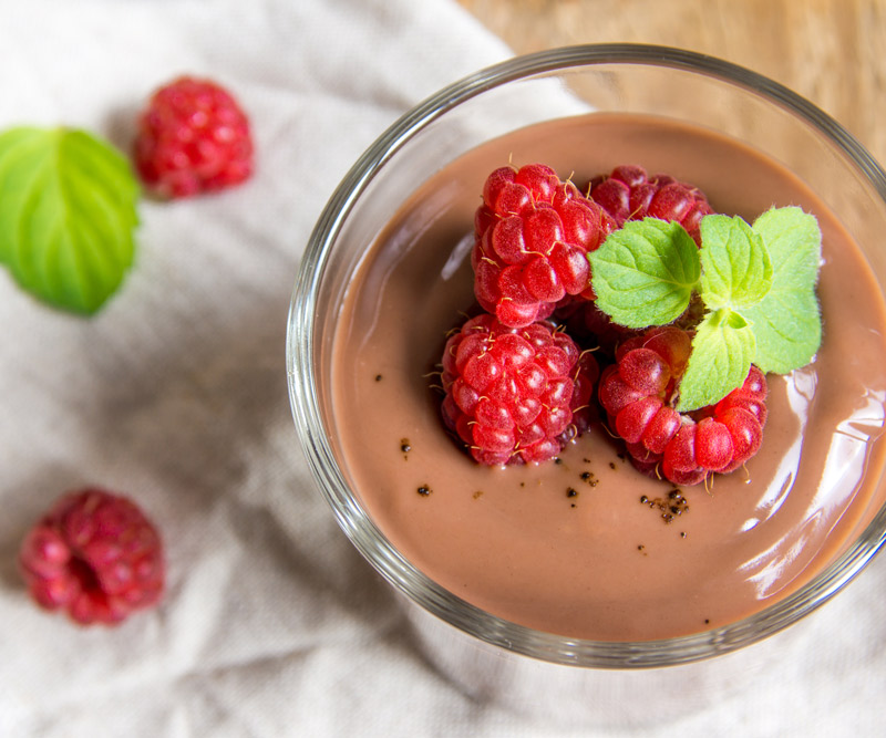 Chocolate pudding with raspberries