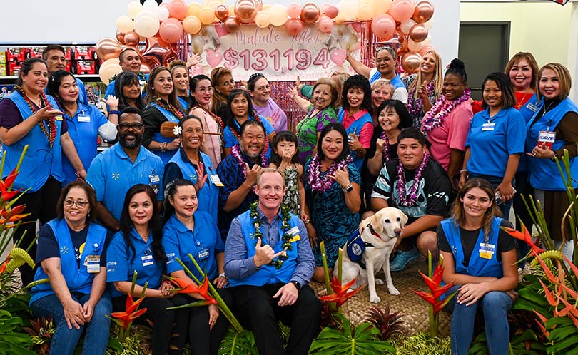 Large group shot of Hilo Walmart employees, Children's Miracle Network representatives and philanthropy leaders.