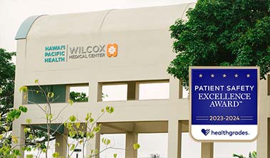 Exterior of Wilcox Medical Center with Healthgrades medallion.