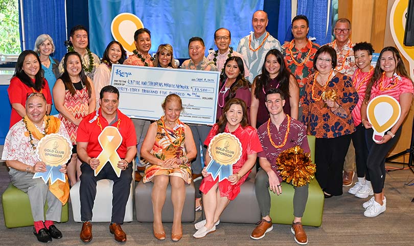 Group shot of supporters at a hospital radiothon fundraiser.