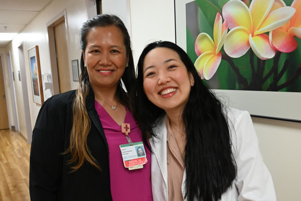 Dr. Marissa Sakoda (right) and Nelia Facunla, Straub Benioff neurology medical assistant, help patients expieriencing chronic neuropathy symptoms find relief.