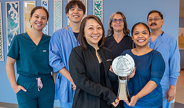 Representatives from across Hawaii Pacific Health posing with the 2026 Gallup Great Workplace Award.
