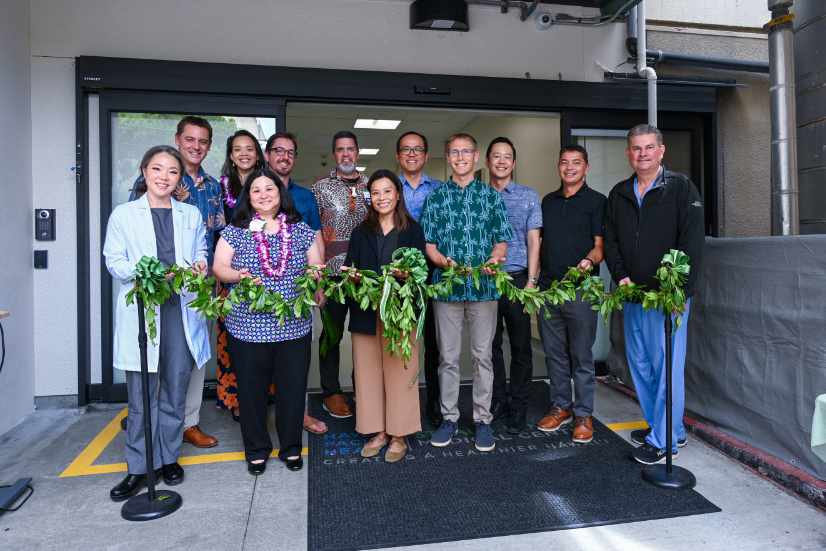 Straub Benioff Medical Center staff holding a maile lei at the opening ceremony for a new Emergency Department (ED).