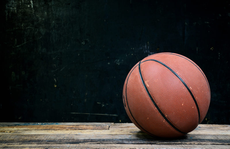 a basketball on a wooden floor