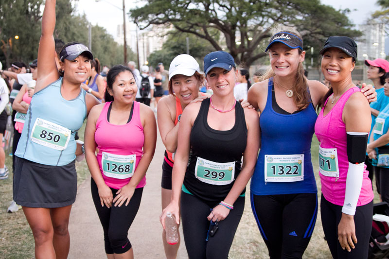 a group of ladies getting ready to run for a 10k