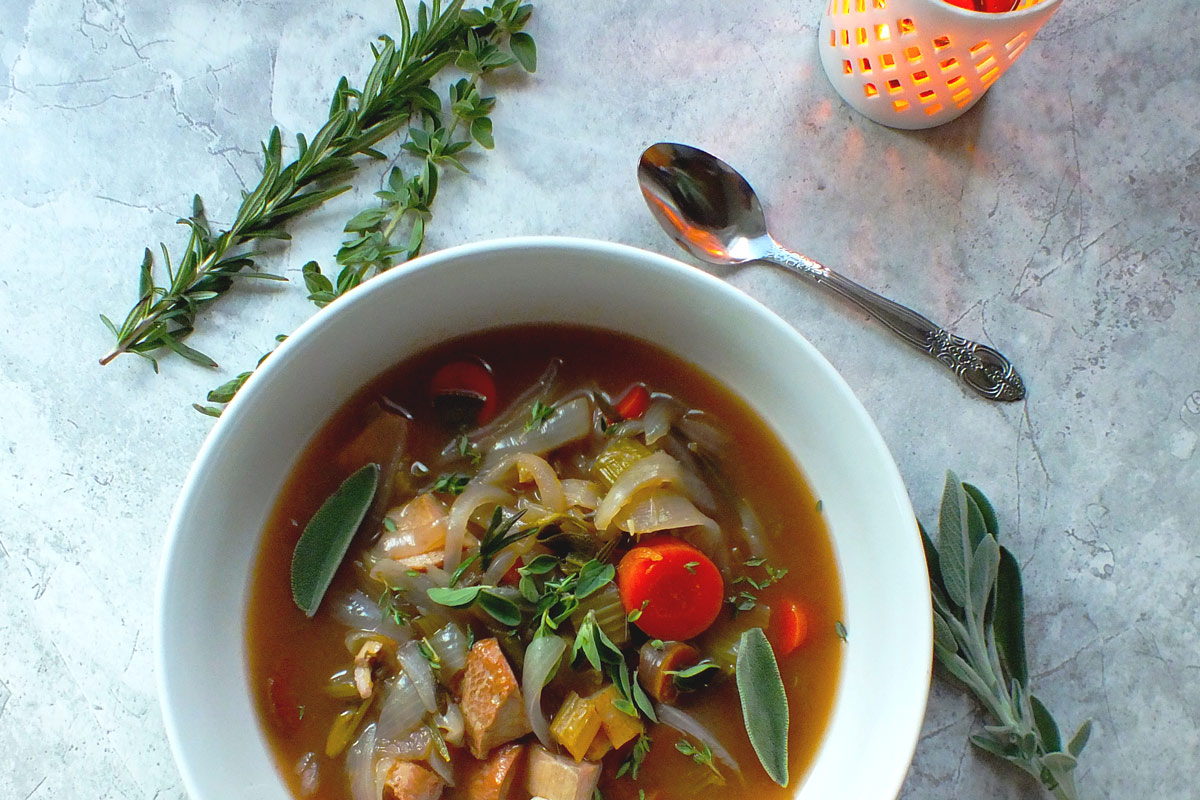 Turkey Soup with Turmeric, Ginger & Fresh Herbs in bowl