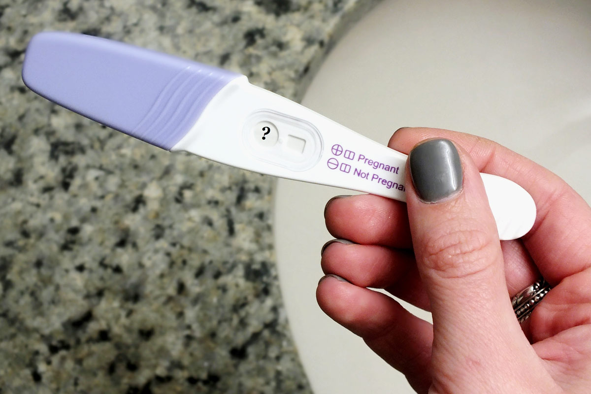 A pregnancy test with a question mark as the result.
