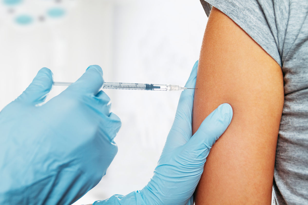 child patient getting an immunization shot