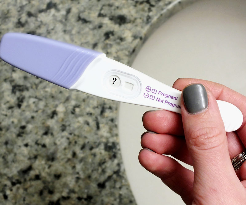 A pregnancy test with a question mark as the result.
