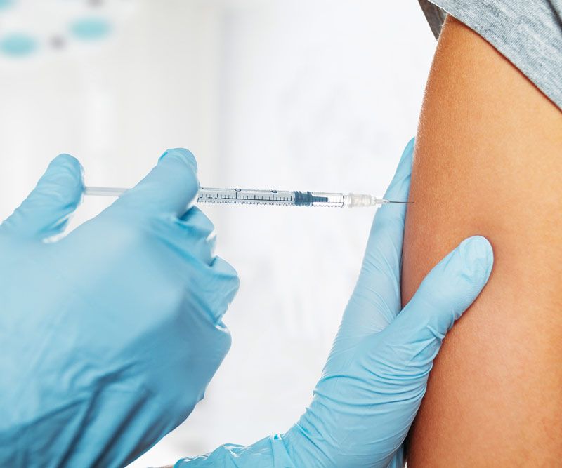 child patient getting an immunization shot