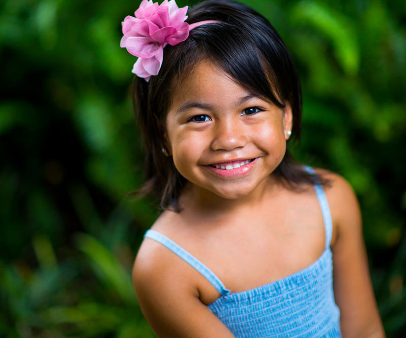 Layla Lacey-Nahale smiling with flower in her hair