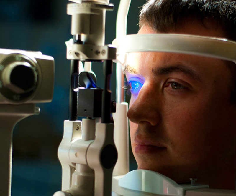 Man getting his eyes examined