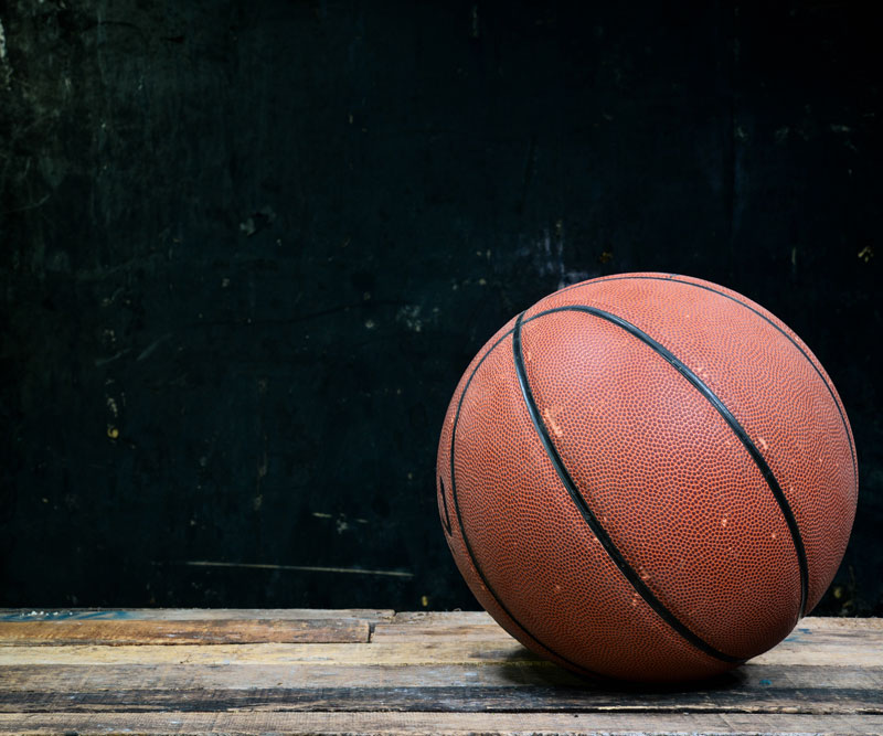 a basketball on a wooden floor