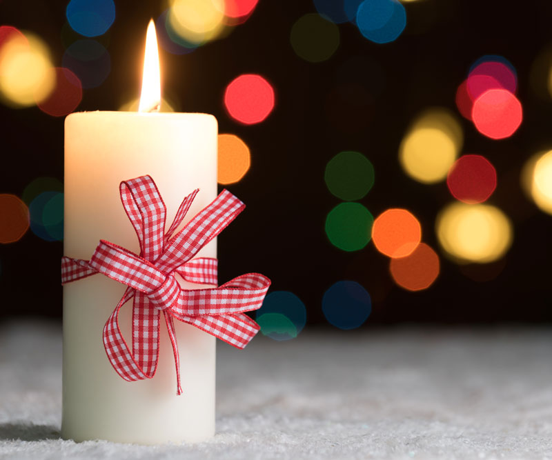 a burning holiday candle
