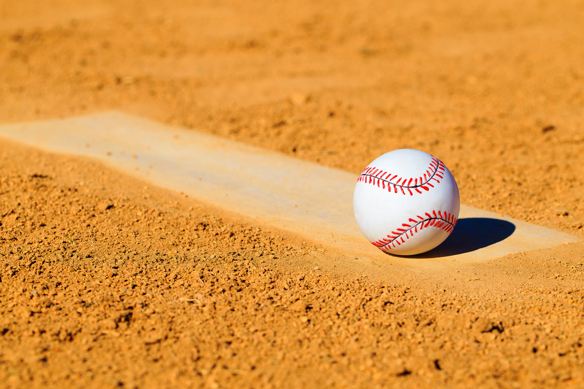 baseball alone in the dirt