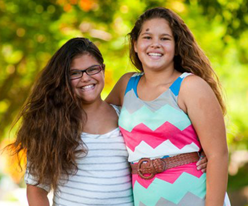 two girls embracing