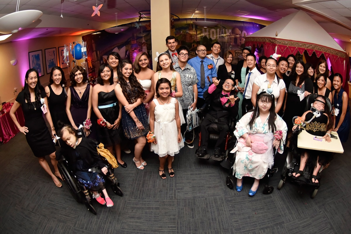 group of teen patients at an annual prom event