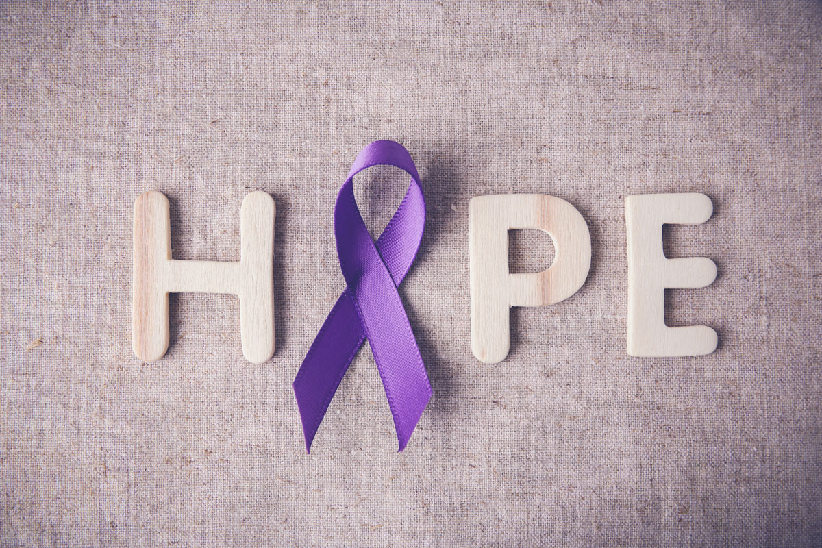 The word hope, with a cancer ribbon